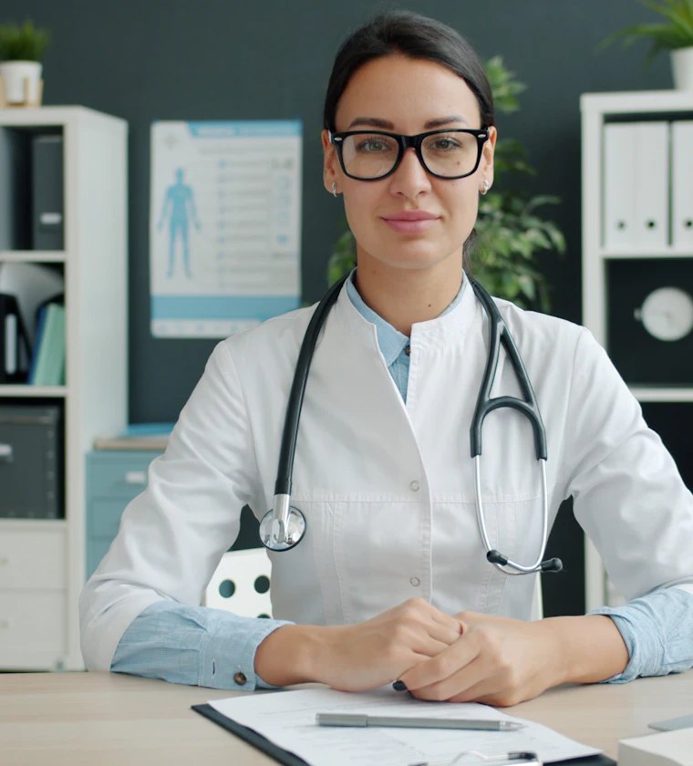 Smiling doctor at Guide Health Hub